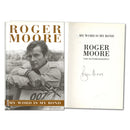 Roger Moore Signed Book